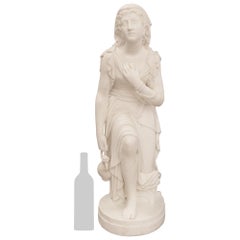 A Italian 19th century white Carrara marble statue signed J. Warrington