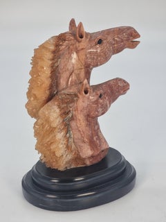 A Italian equestrian specimen marble carved study of a wild stallion and mare