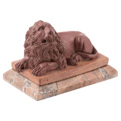 Modèle italien d'un lion couché en terre cuite, fin du 19ème siècle
