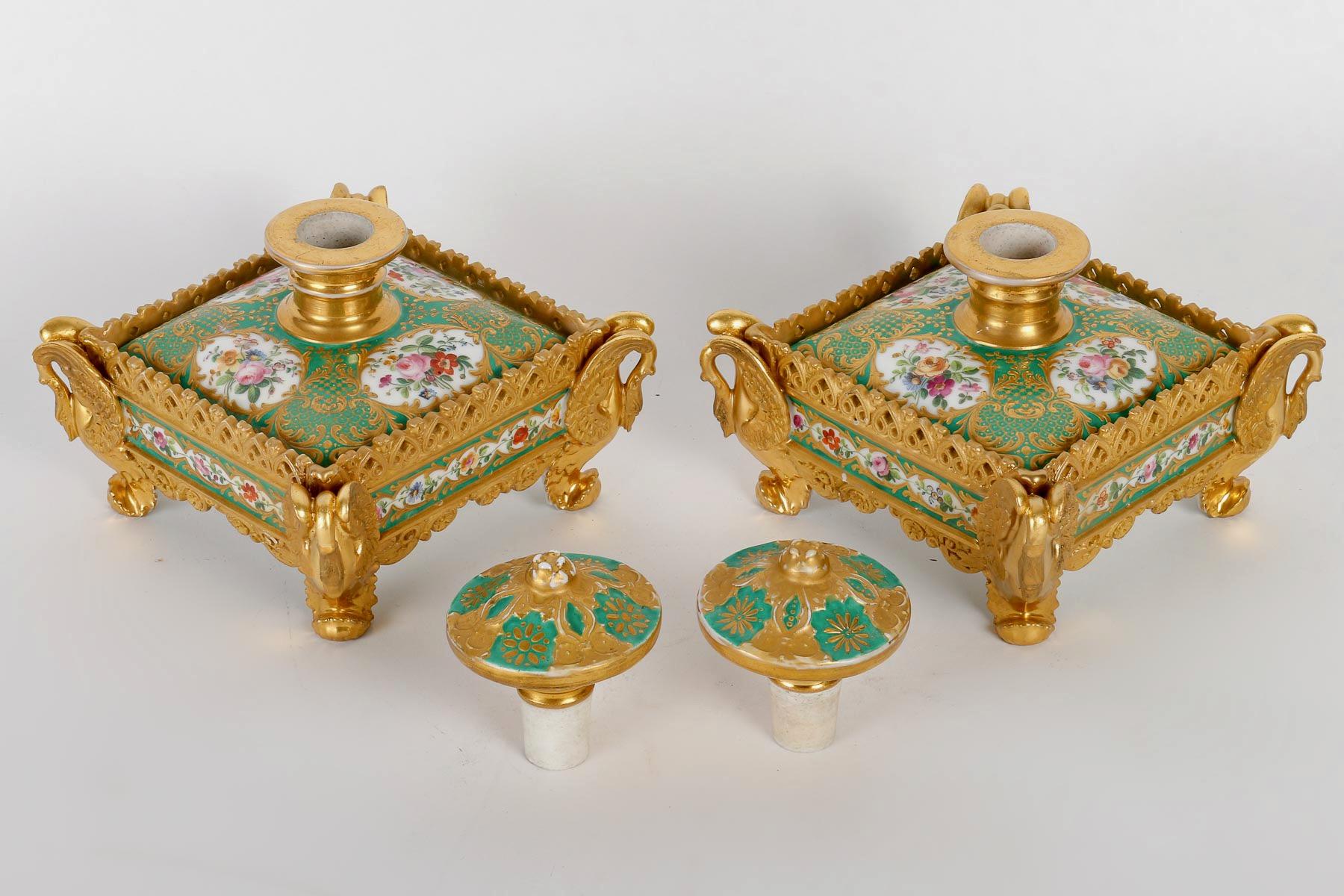 A Jacob Petit Green Ground and Gilt Porcelain Pair of Scent-Bottles and Stoppers 
Both painted with polychromed bouquets within gilt cartouches, the scent-bottle of square form with mushroom finial, the top edged with a pierced gilt gallery, the