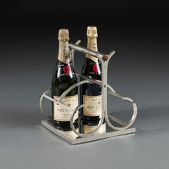 A Jacques Adnet Four Bottle Wine Carrier