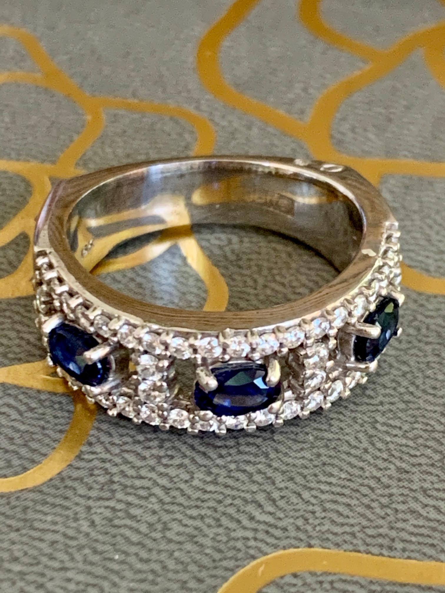 Women's A. Jaffe Band Style Blue Sapphire and Diamond 18 Karat White Gold Ring For Sale