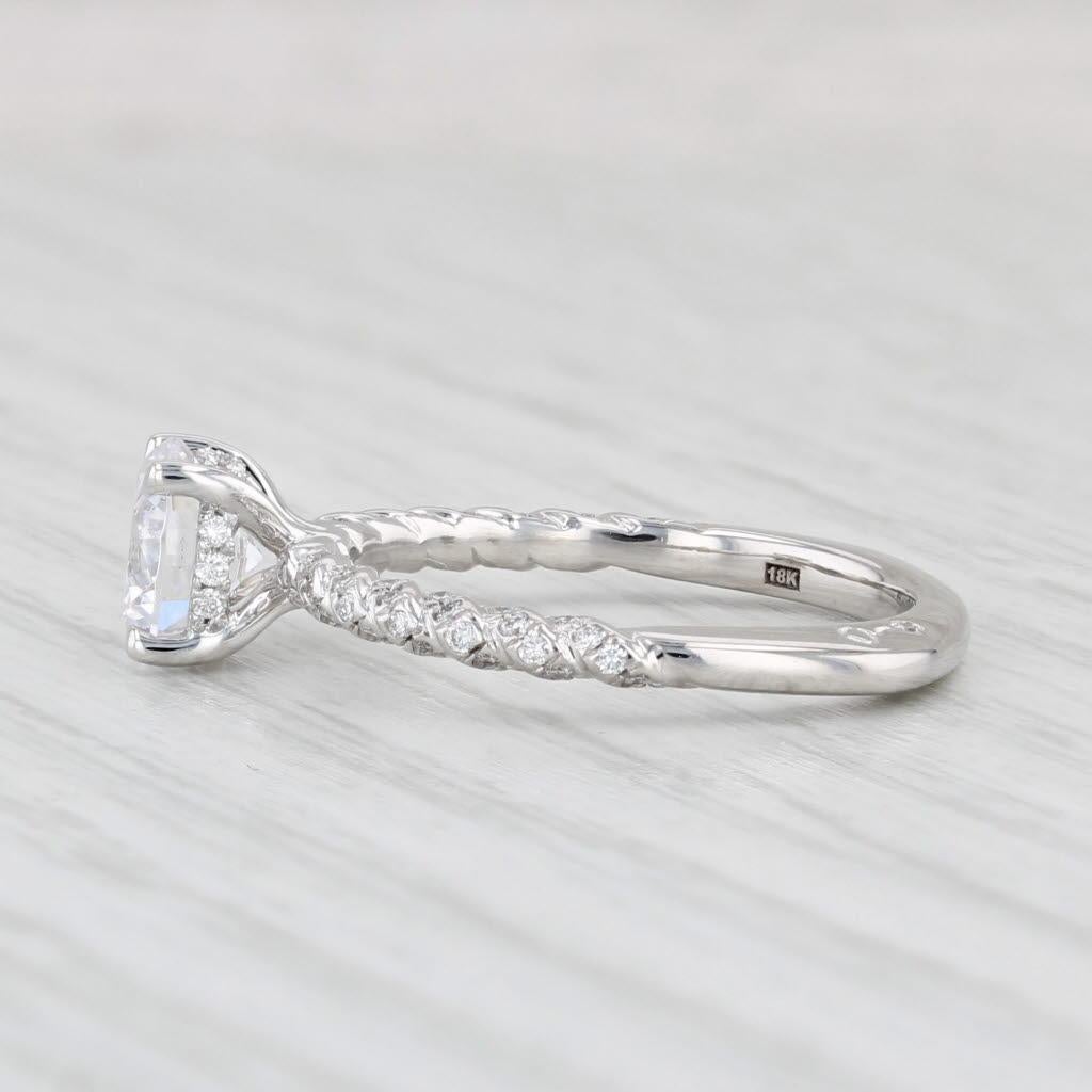 This lovely ring is a semi mount designed to hold a Round 6.5mm / 1ct diamond or stone of your choice. There is a placeholder stone set in the center of the ring.

Gemstone Information:
- Natural Diamonds -
Total Carats - 0.22ctw
Cut - Round