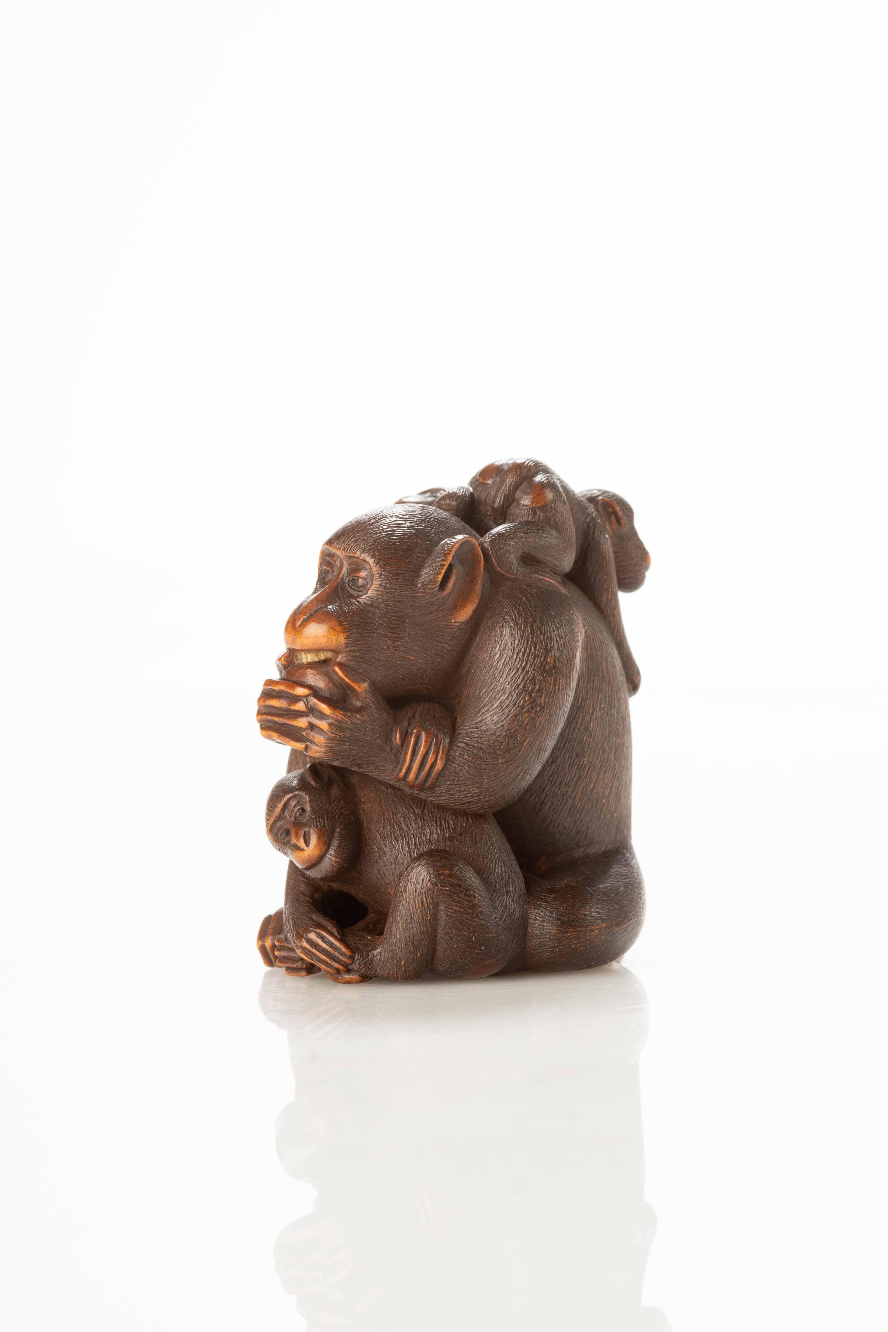 Boxwood netsuke, depicting a group of five monkeys, with the largest, surrounded by cubs, feeding on a peach.

The netsuke is signed Masanao, within an oval reserve under the base.

Origin: Japan

Period: Edo 19th century

Dimensions: 5 x 5.5 x 3.8