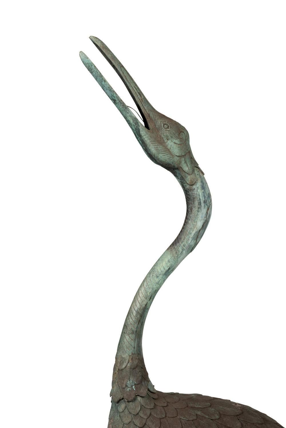 A Bronze Garden Statue Of A Crane, Japanese

Realistically modelled with natural verdigris.

Provenance: John Dunn Antiques.