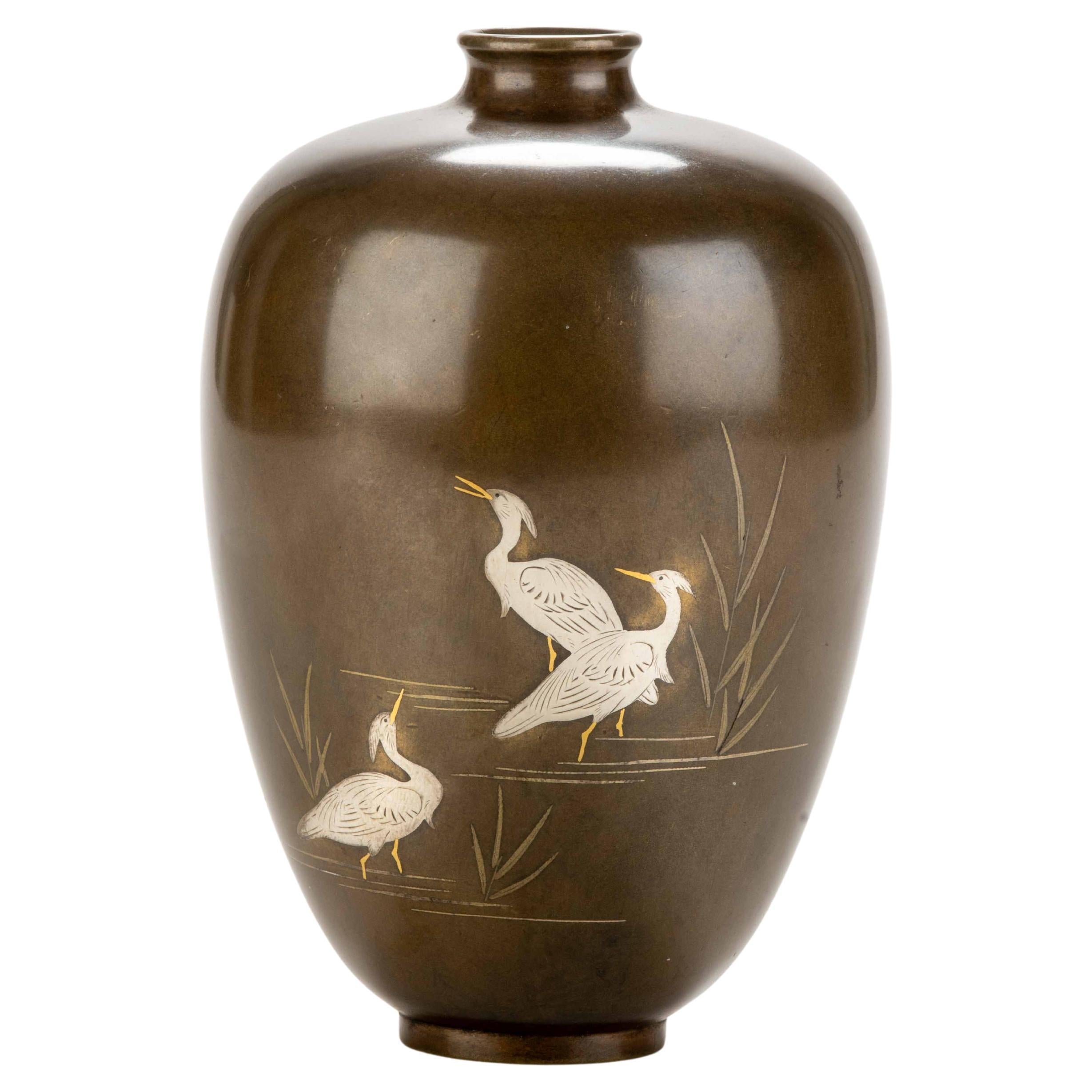A Japanese bronze vase with three egrets For Sale