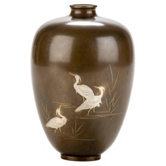 A Japanese bronze vase with three egrets