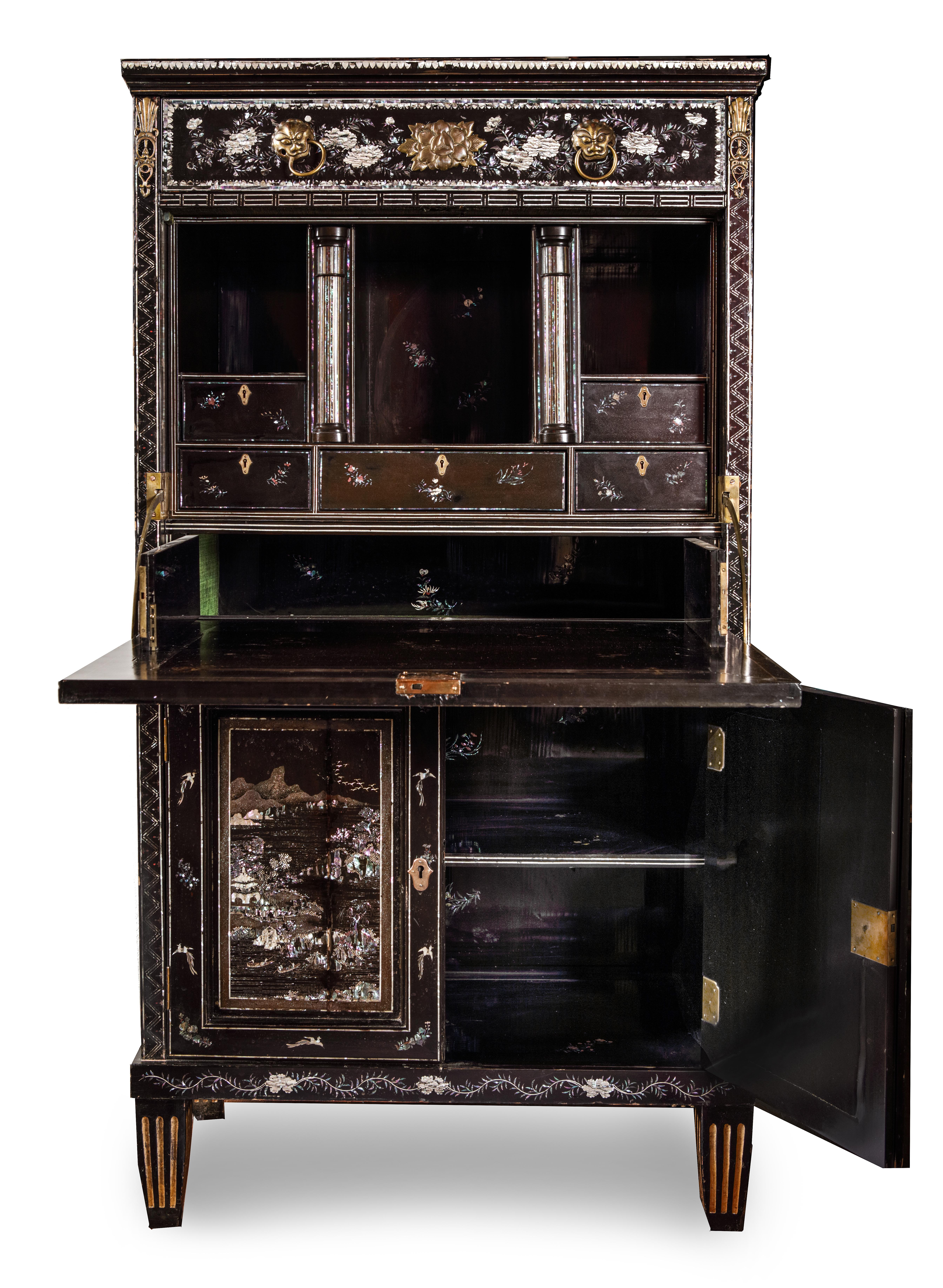 A rare Japanese export lacquered secretaire for the American market

Circa 1800-1830, Colonial

Overall densely decorated with flower sprays and landscapes, minutely inlaid with mother-of-pearl and abalone. The lacquer with a deep black gloss.