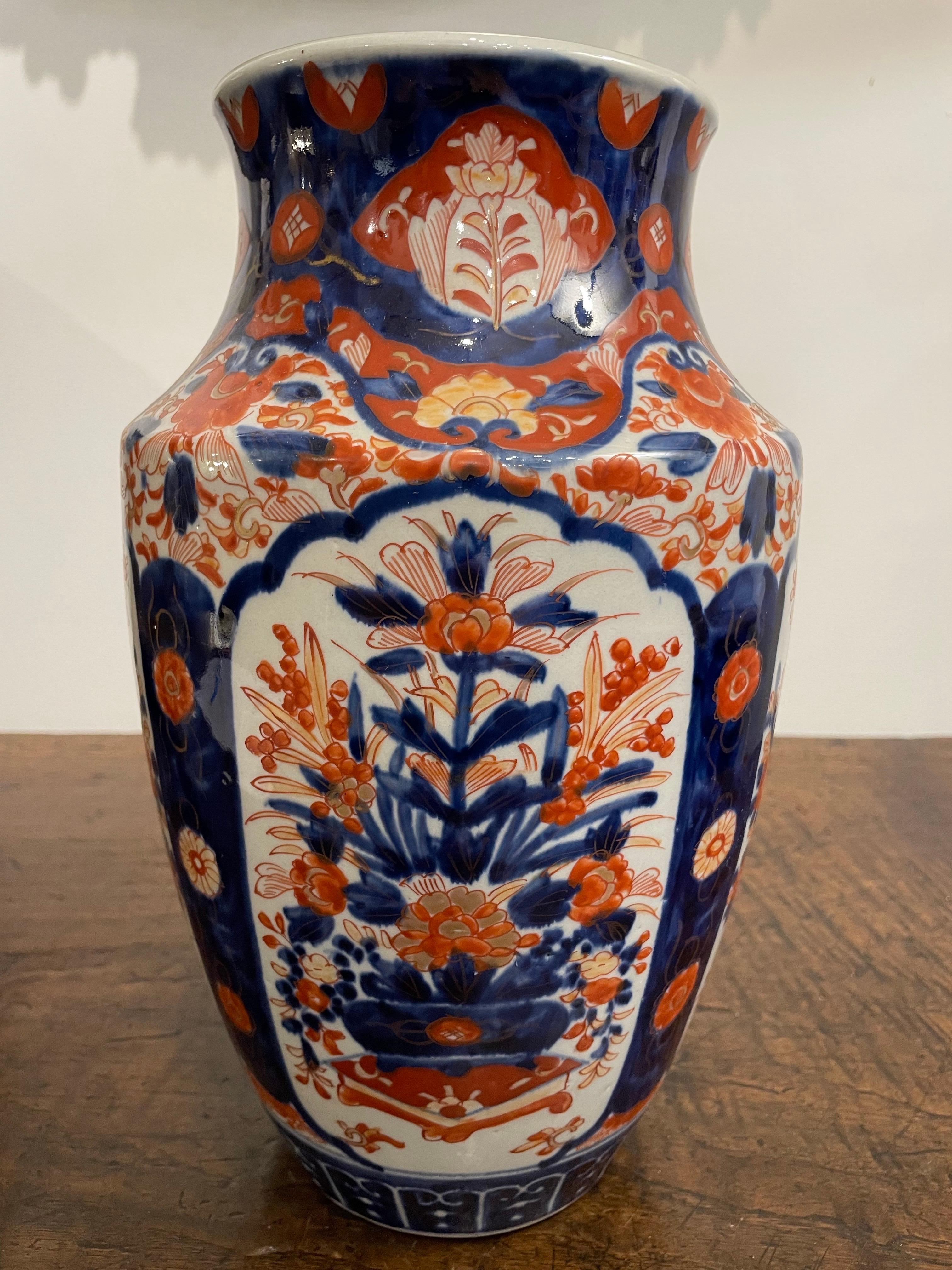 A Japanese Floral Imari Vase, 19th Century
                                                                                             	    
Provenance: Private Australian Collection.

Description:
The gently everted neck with a blue serpentine