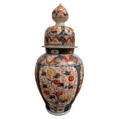 A Japanese Fluted and Covered Imari Baluster Vase, 19th Century