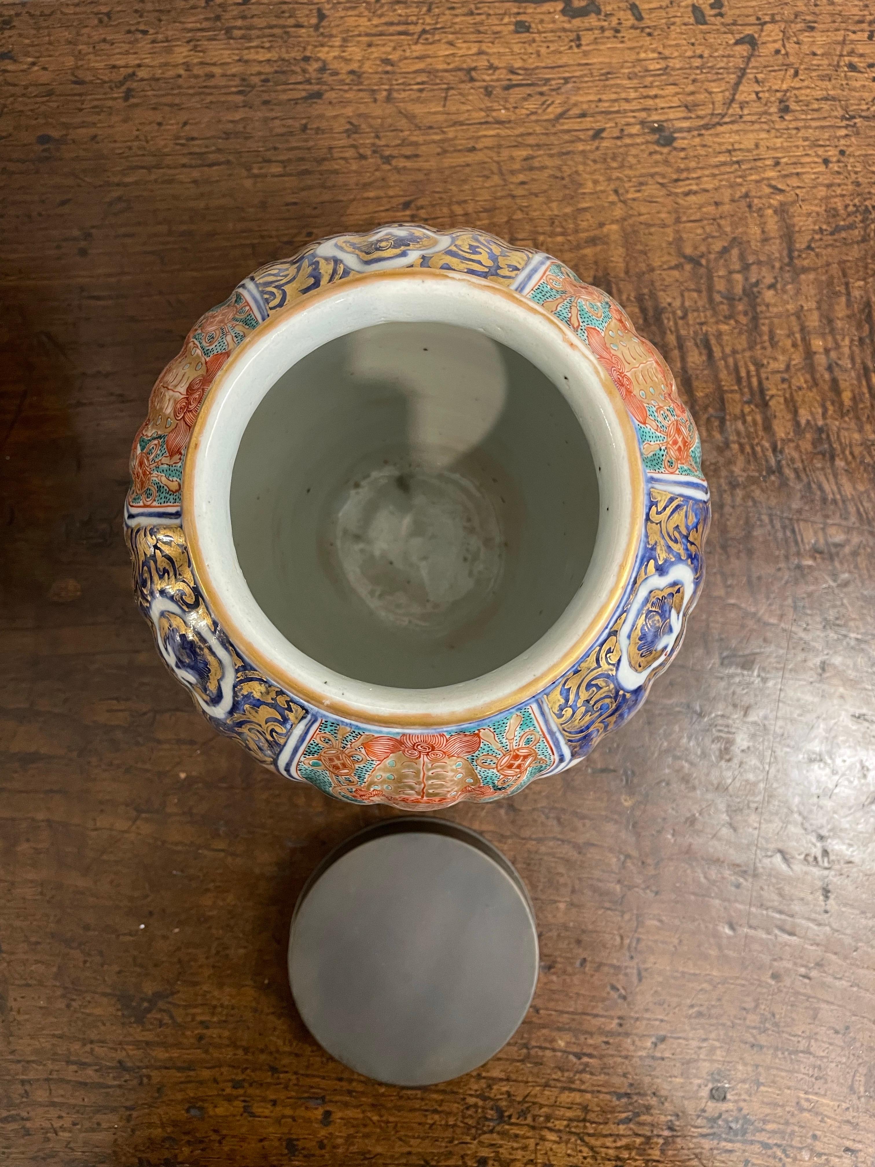Hand-Crafted A Japanese Fluted Imari Vase with Mark and Metal Cover, 19th Century For Sale