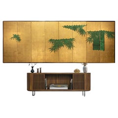 A Japanese Folding Screen Decorated With Bamboo Plants On A Gold-leaf