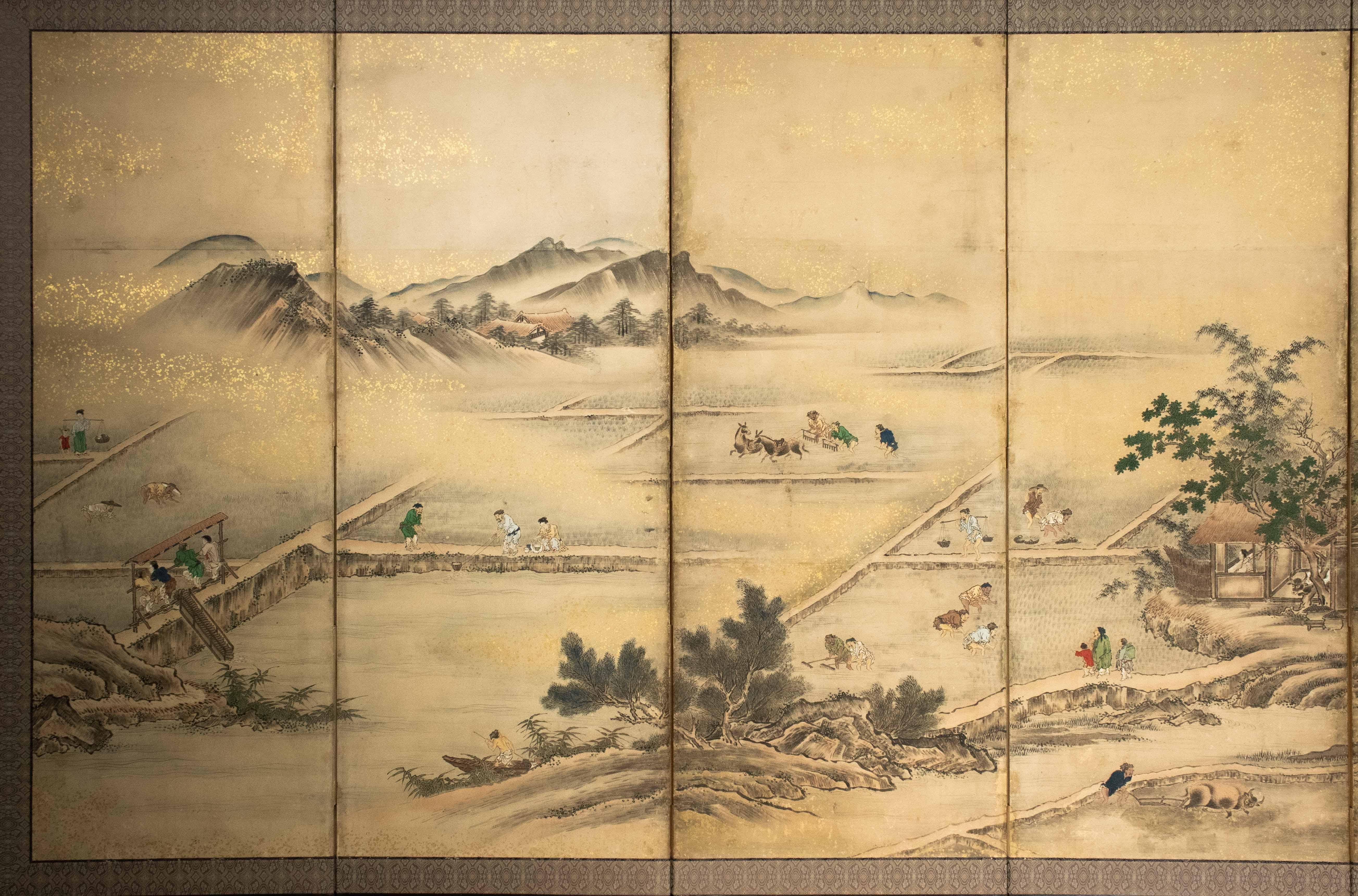 A six-panel byōbu screen, painted in polychrome pigments and gold powder on a light background, depicting a vast agricultural landscape immersed in nature, with rice fields, pathways, and a valley framed by gentle hills and mountainous