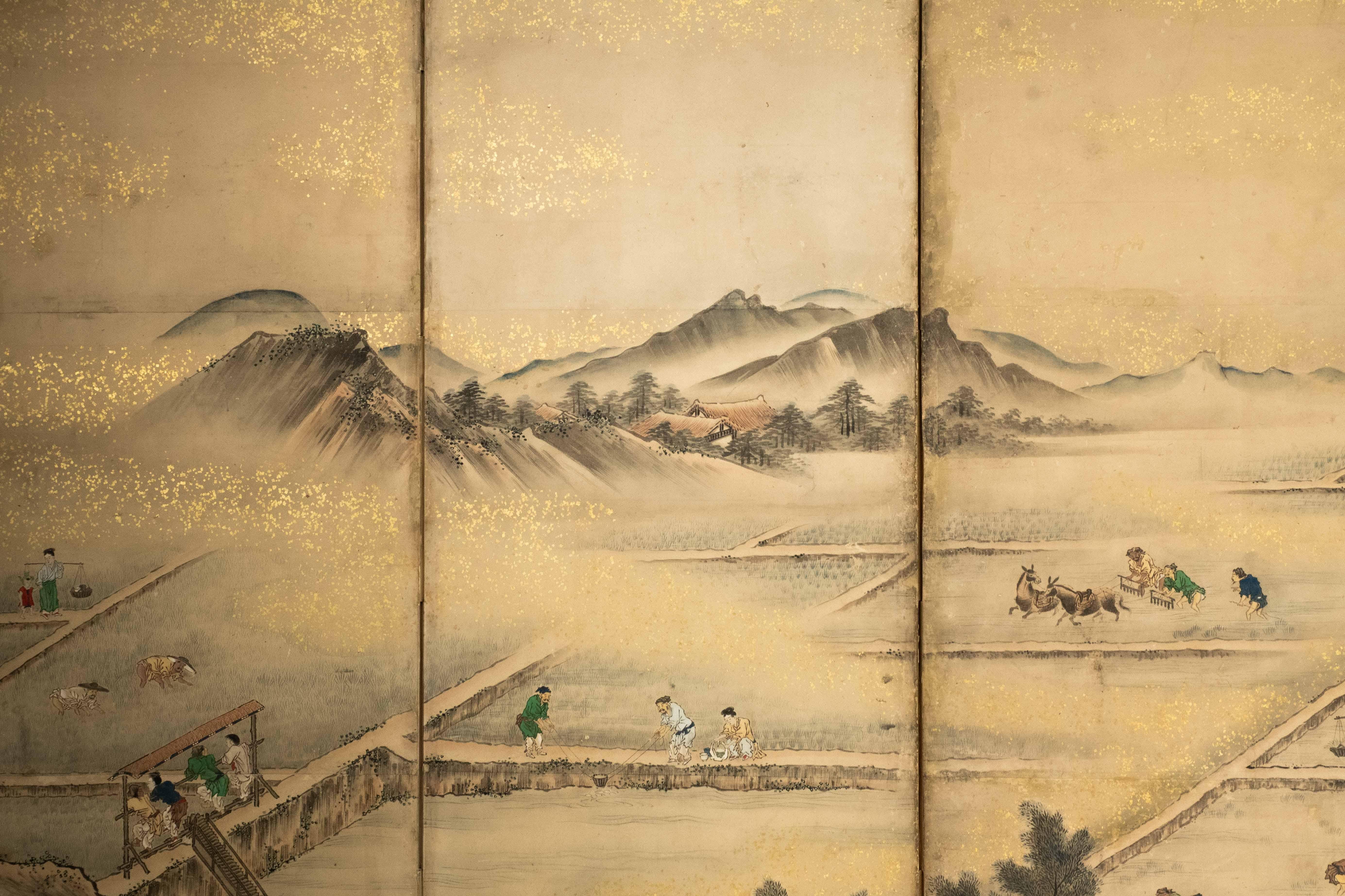 19th Century A Japanese folding screen depicting an agricultural landscape, signed Eisho Kano in vendita