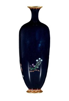 A Japanese Manchurian cranes cloisonné vase decorated with polychrome enamels