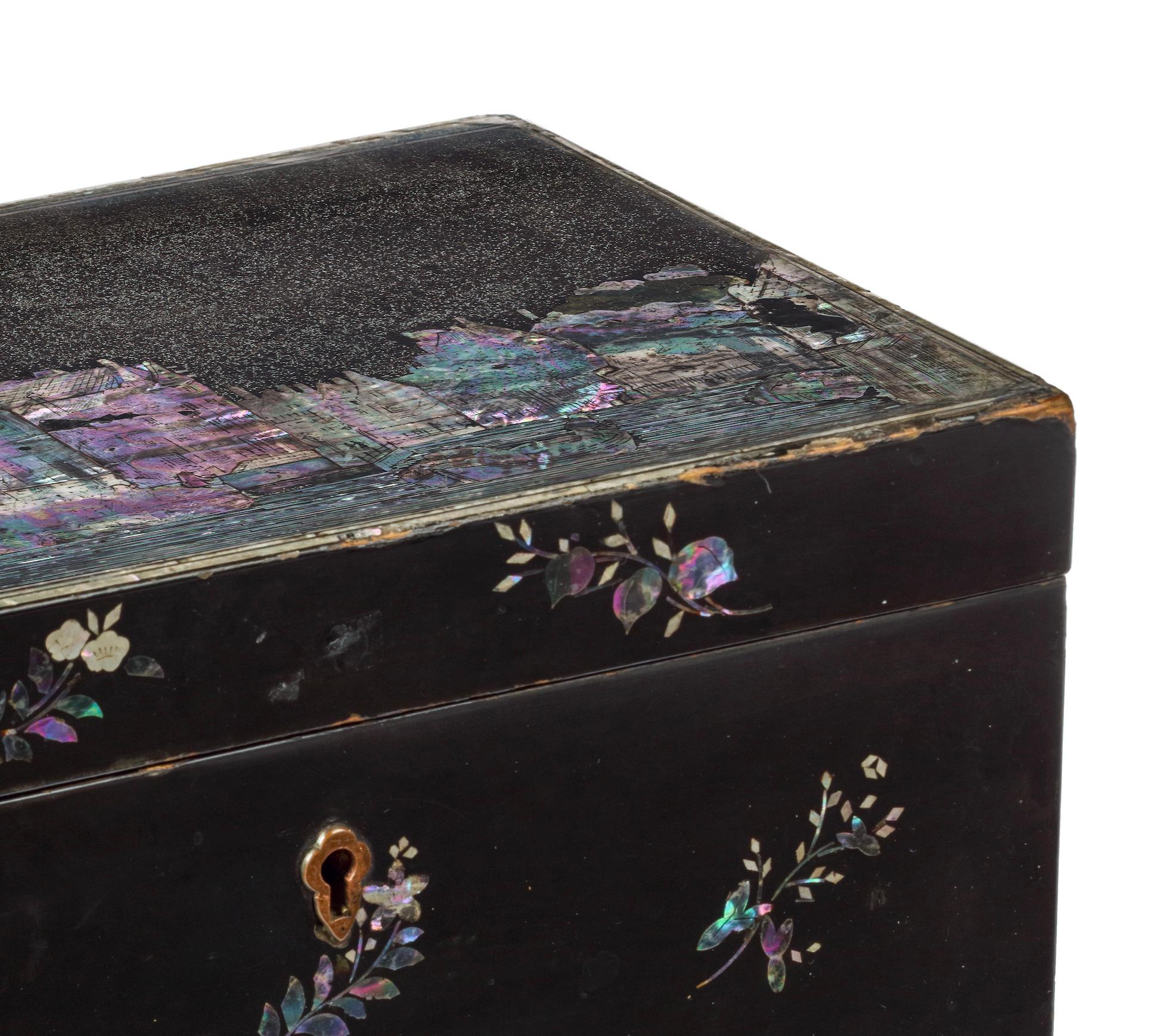 A Japanese Nagasaki export lacquer box with mother-of-pearl depiction of the Amsterdam ‘Trippenhuis’
Edo-period, circa 1830

H. 12.5 x W. 24 x D. 15 cm
?
The house depicted on the lid is Het Trippenhuis, a neo-classical mansion on the