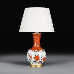 A Japanese Porcelain Imari Vase as a Lamp on a Giltwood Base