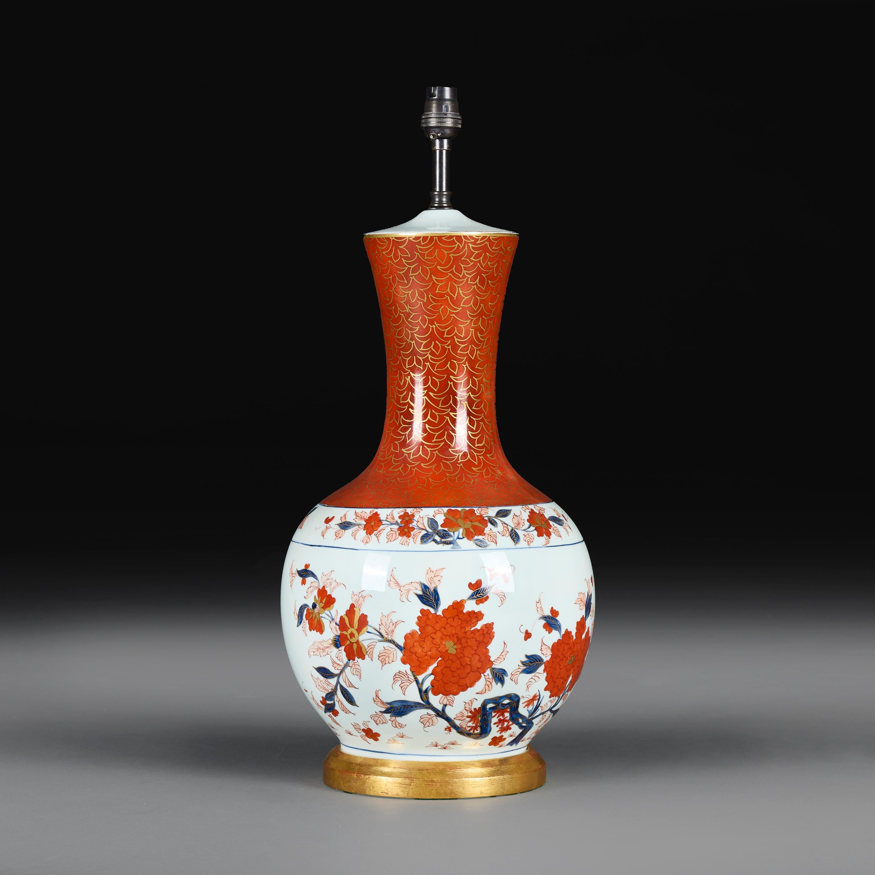 A Japanese Porcelain Imari Vase as a Lamp on a Giltwood Base In Good Condition For Sale In London, GB