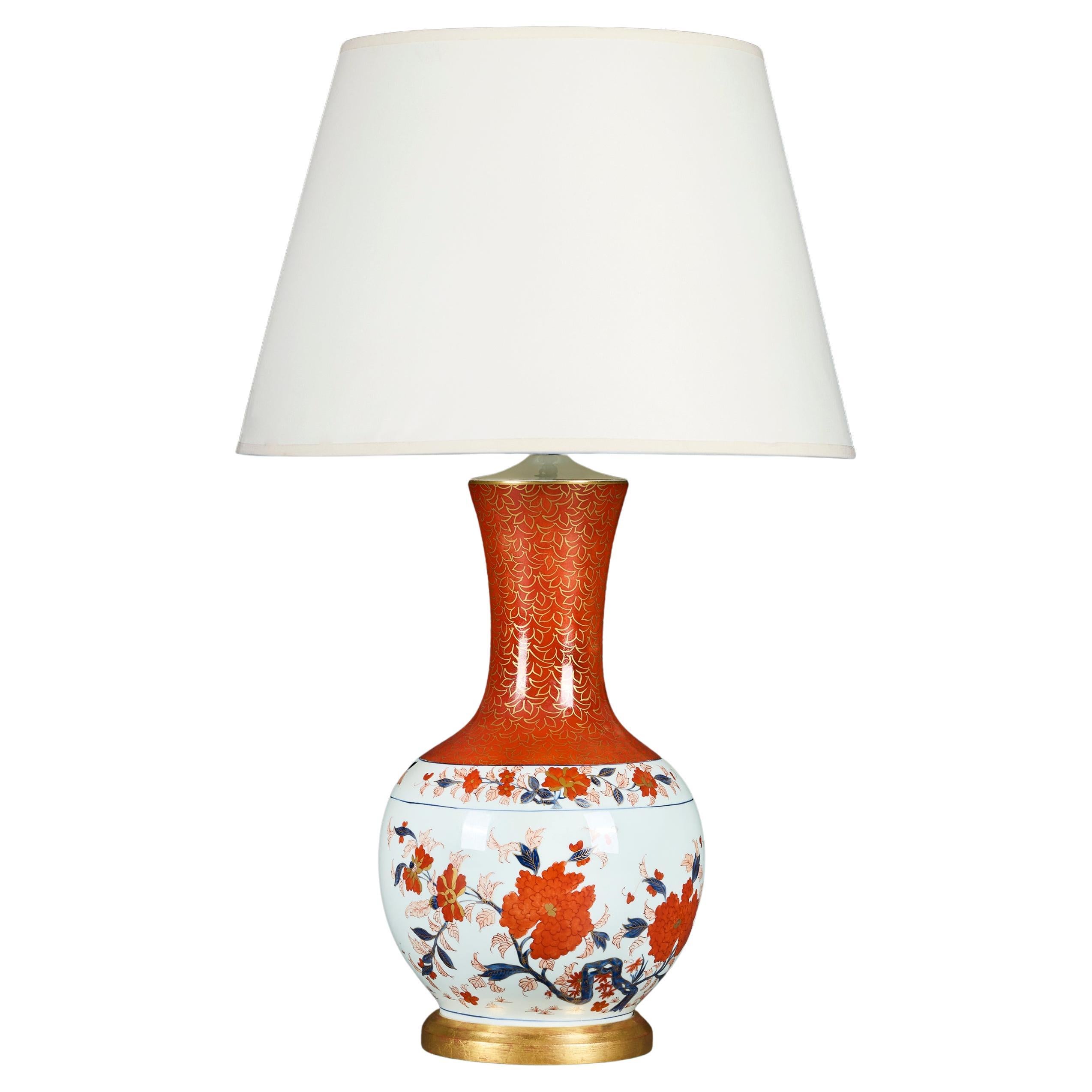 A Japanese Porcelain Imari Vase as a Lamp on a Giltwood Base