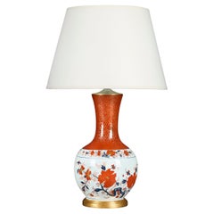 A Japanese Porcelain Imari Vase as a Lamp on a Giltwood Base