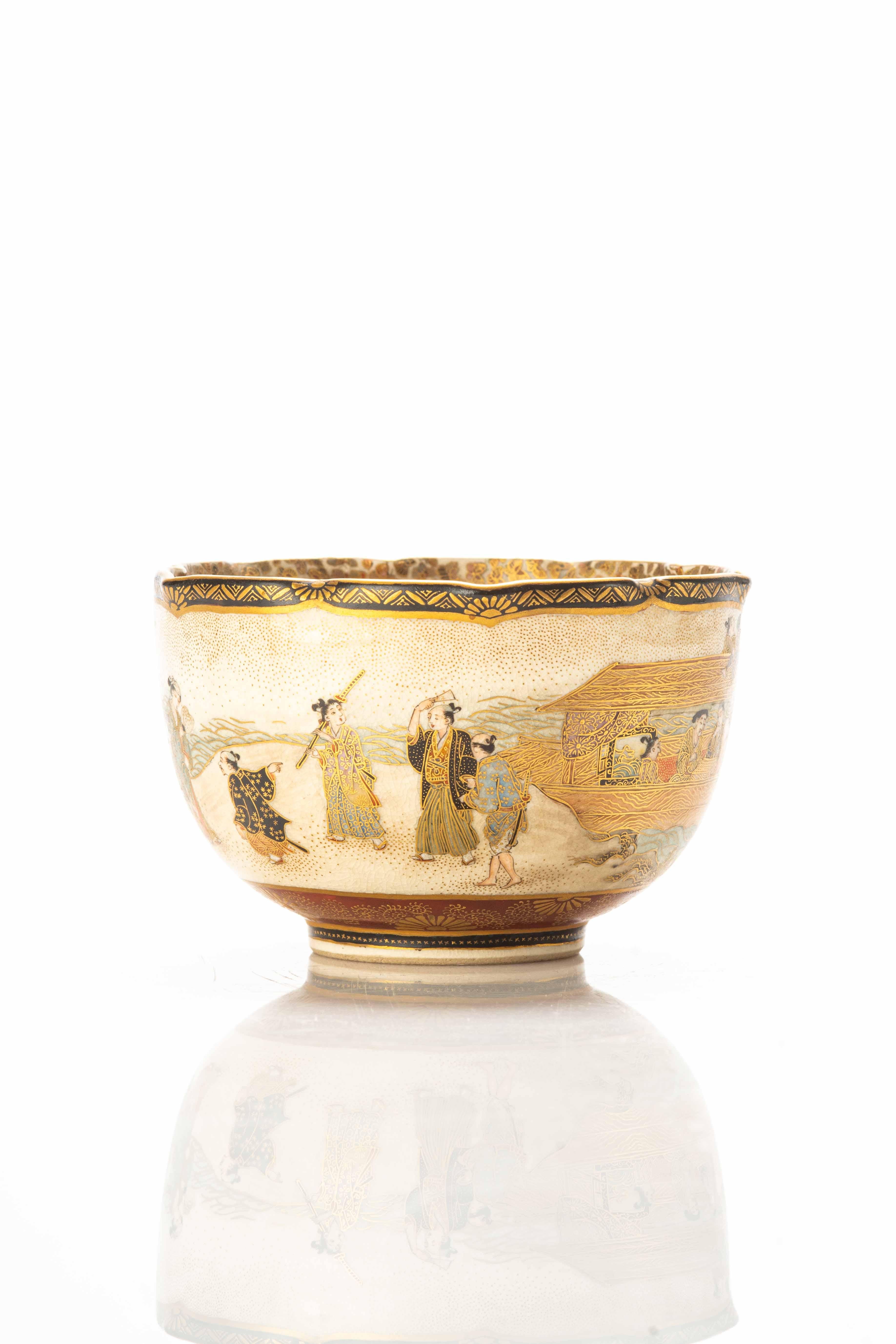 Satsuma ceramic lobed bowl with curved corners and embellished with a refined scene of daily life along a watercourse on the outside. The interior is adorned with graceful butterflies, creating a harmonious blend of nature and craftsmanship.

This
