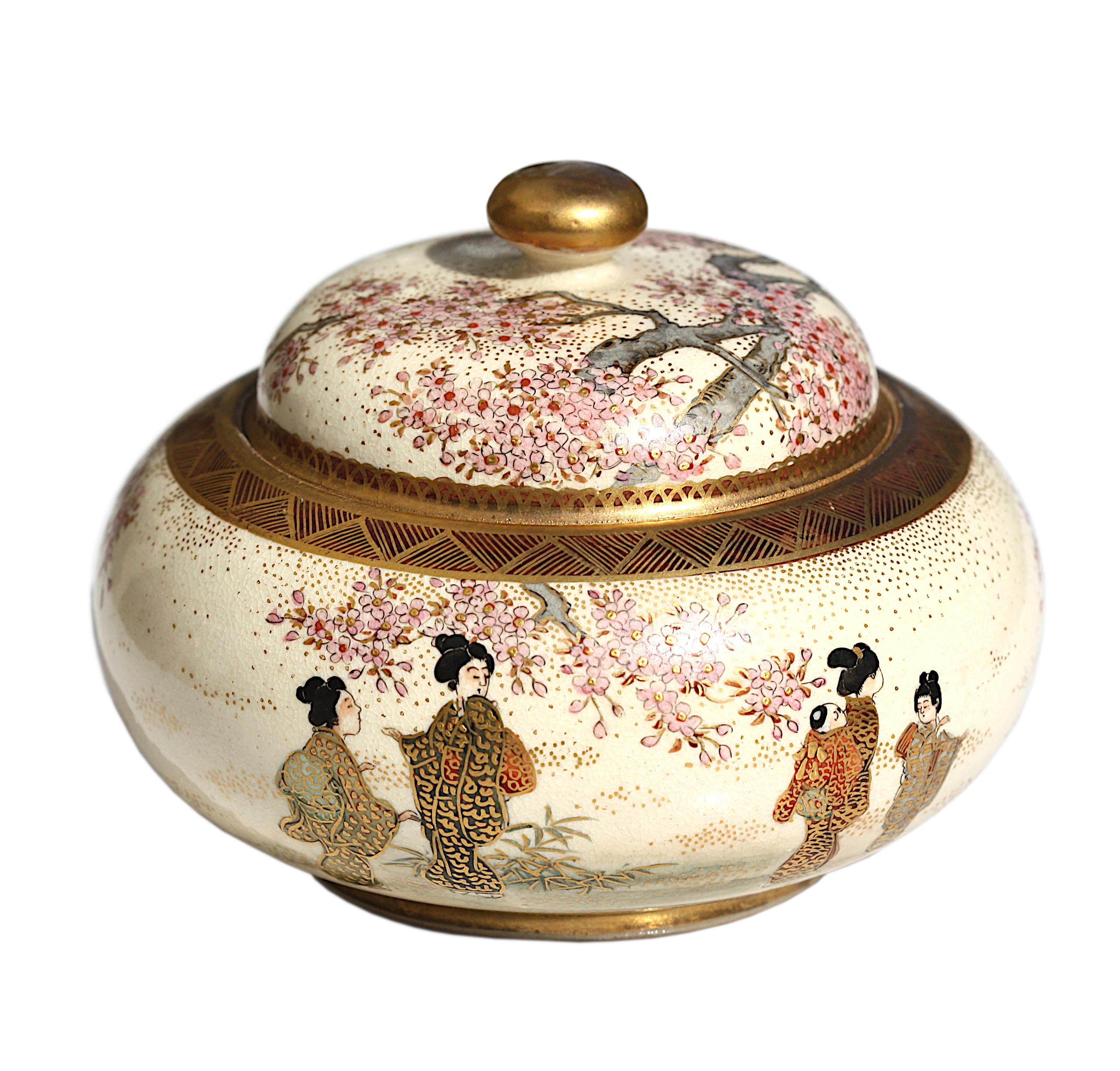 
A Japanese Satsuma earthenware circular box and cover,
19th/early 20th century
sealed with Satsuma