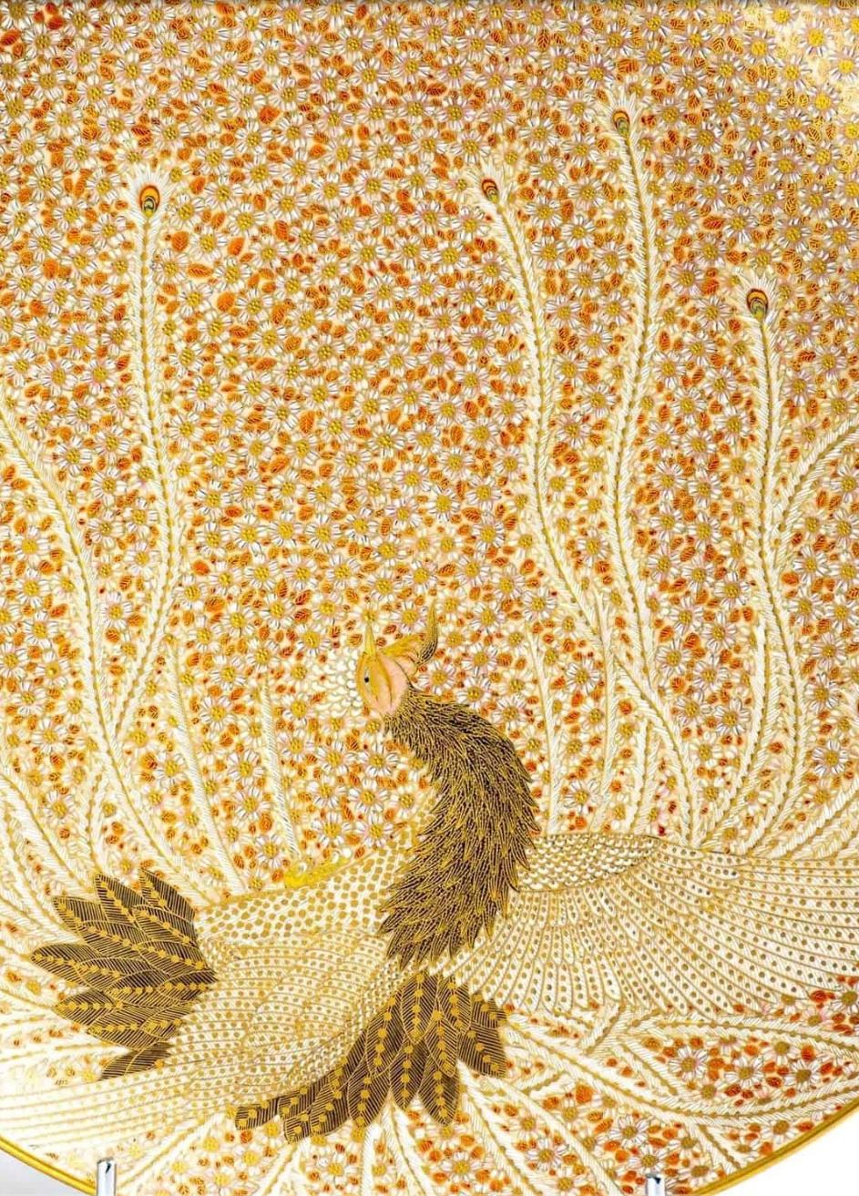 Large ceramic plate from Satsuma depicting a Phoenix 鳳凰 about to take flight with wings spread wide and long feathers fluttering finely decorated with gold and relief glazes.

Signed ‘Satsuma-yaki Shōzan ga’ 薩摩焼 祥山画 (Satsuma ware, painted by
