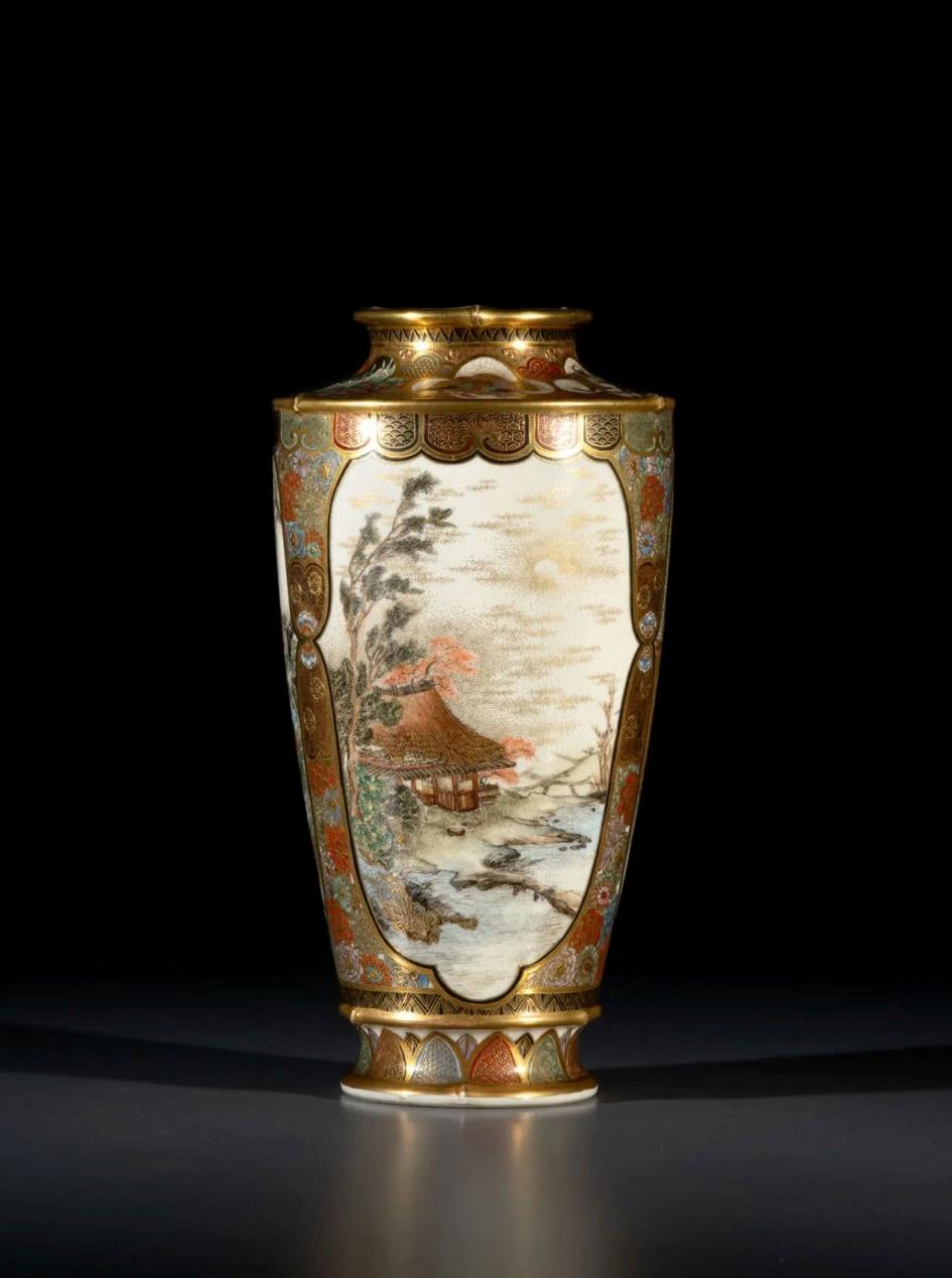 A Satsuma vase characterized by three oval reserves adorned with naturalistic representations. One of the reserves depicts a flying bird among flowers, above a striking rocky water passage.

Scenes of daily life and landscapes are portrayed in the