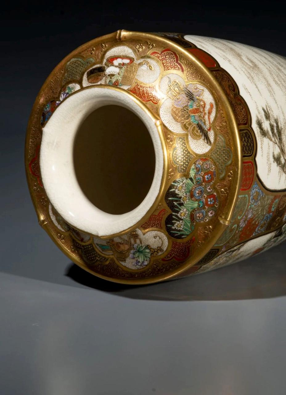 19th Century A Japanese Satsuma vase characterized by three oval reserves, signed by Ryozan