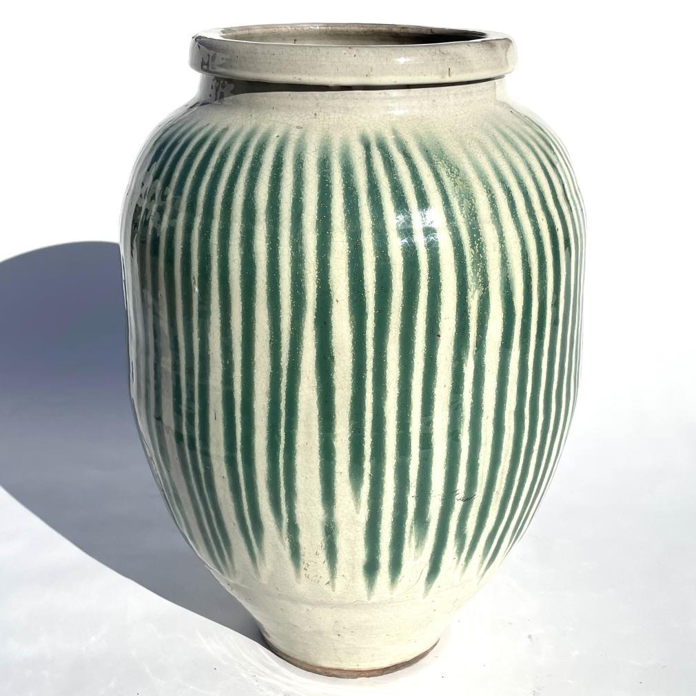 Meiji A Japanese Shigaraki Stoneware Sake Storage Jar, circa 1870.