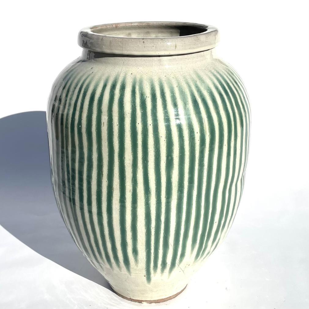Fired A Japanese Shigaraki Stoneware Sake Storage Jar, circa 1870.