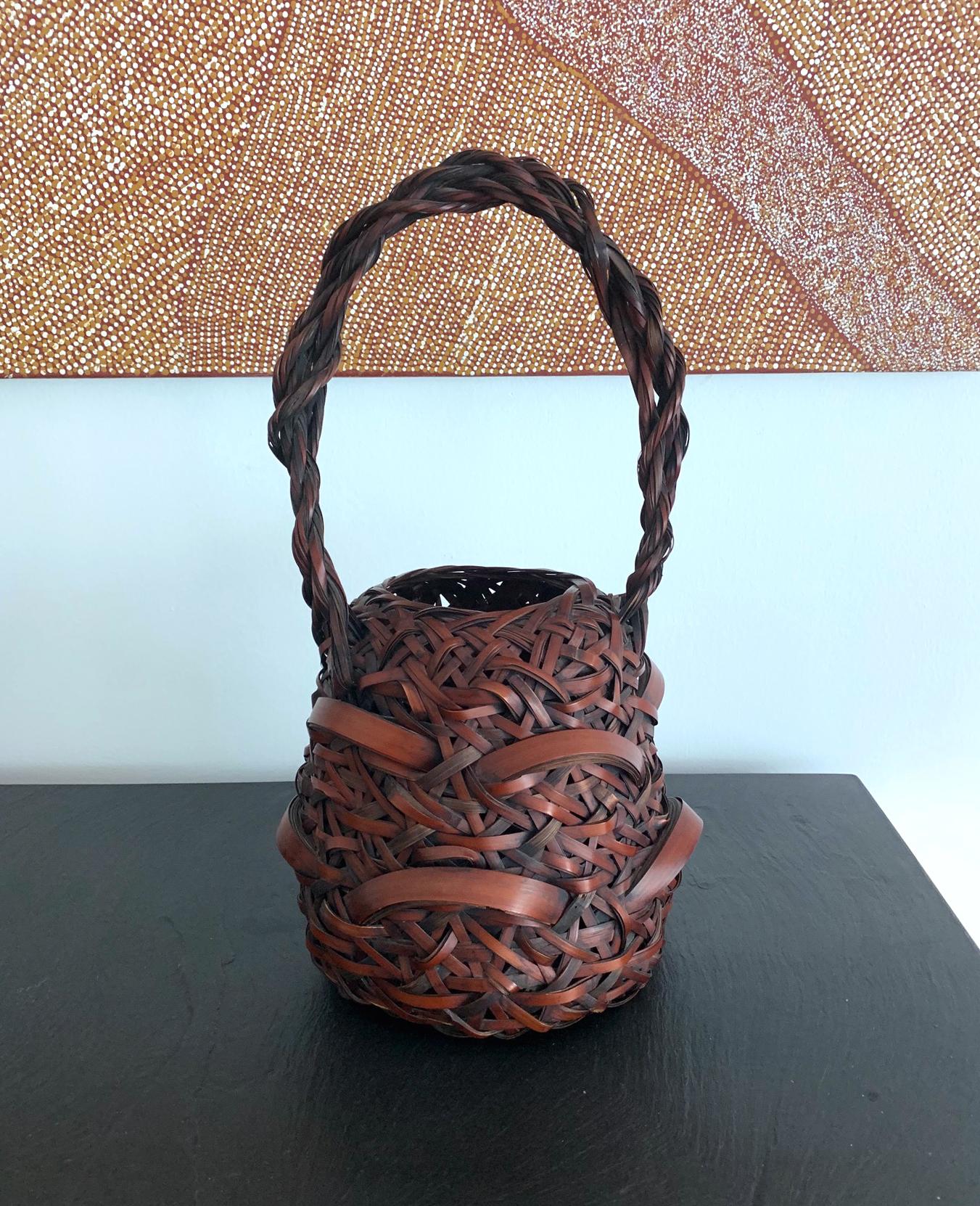 Bold, rustic and with an earthy free spirit, this wagumi style flower basket (ikebana) was designed and woven to evoke a sense of serenity an humbleness during the tea ceremony. Woven in a rather solid shape with an illusion of heavier mass, thinner