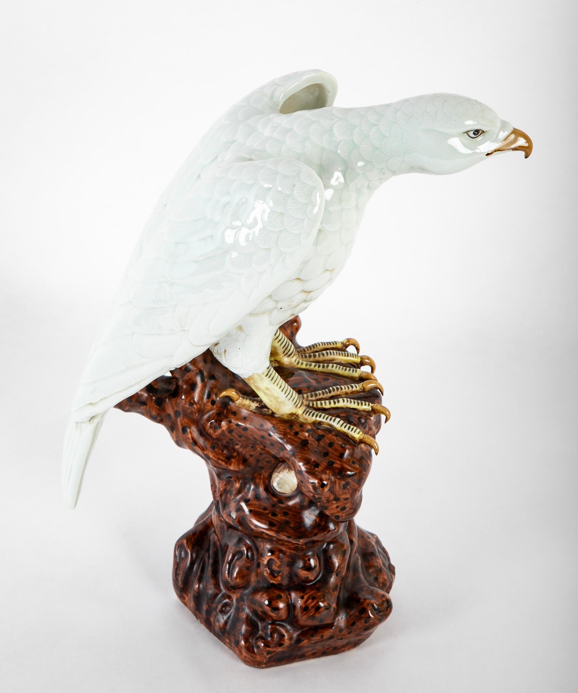 A Japanese White Glazed Porcelain Hawk Perched on a Tree Stump In Good Condition For Sale In Stamford, CT