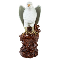 Antique A Japanese White Glazed Porcelain Hawk Perched on a Tree Stump