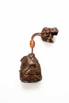 A Japanese wooden inro depicting a carp