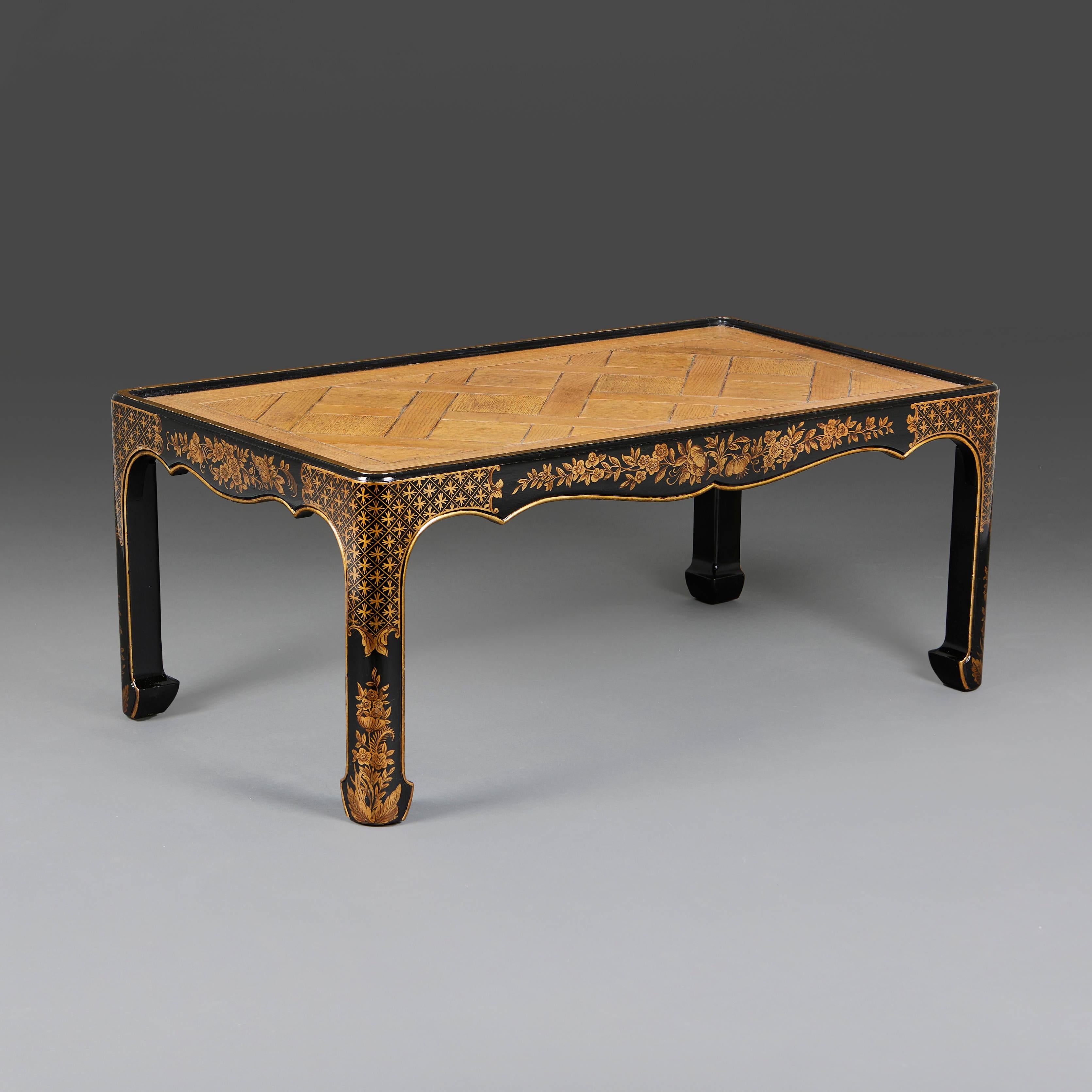 English A Japanned Black Lacquer Coffee Table with Parquetry Top For Sale