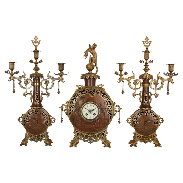 Japonisme Gilt-Bronze and Brass Three-Piece Clock Set For Sale