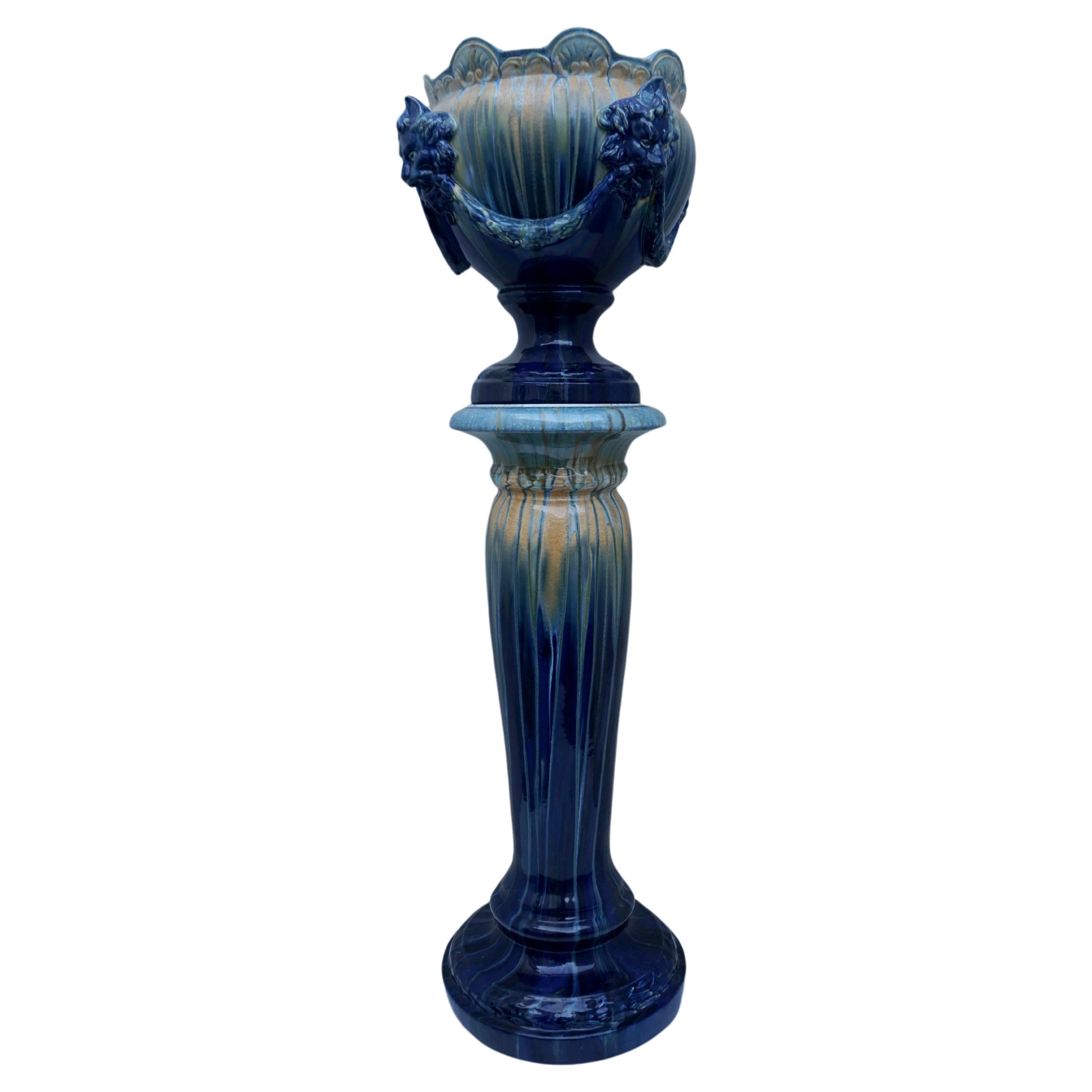 A Jardiniere on Column with Lion Head Decor in Flemish Earthenware Style For Sale