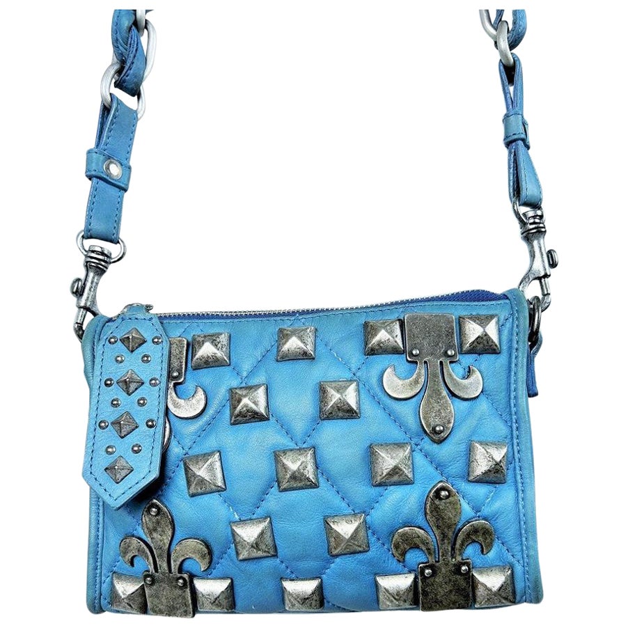 Bolso Humorístico Jean-Charles de Castelbajac de piel con tachuelas azules Circa 1995 en venta