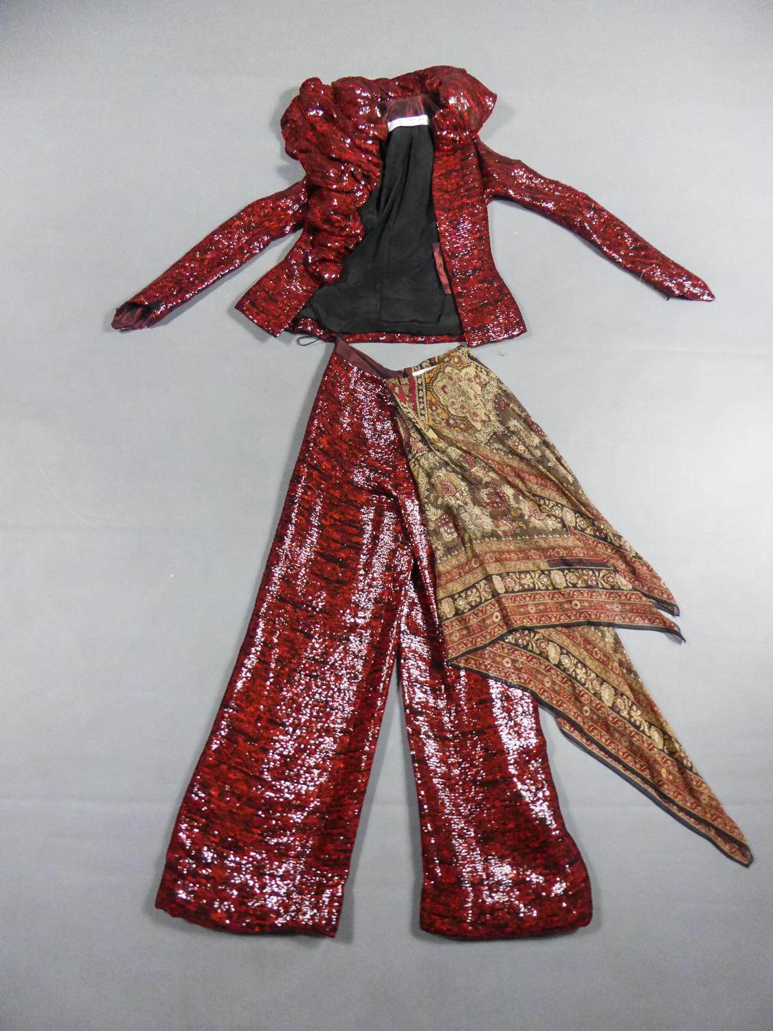 Fall Winter Collection 2001-2002
France

Jacket and pants set for Haute Couture Fashion Show - Look n ° 13 by Jean-Louis Scherrer - Stéphane Rolland, Fall Winter Collection 2001-2002. Astonishing marriage of red and black sequin embroidery and silk
