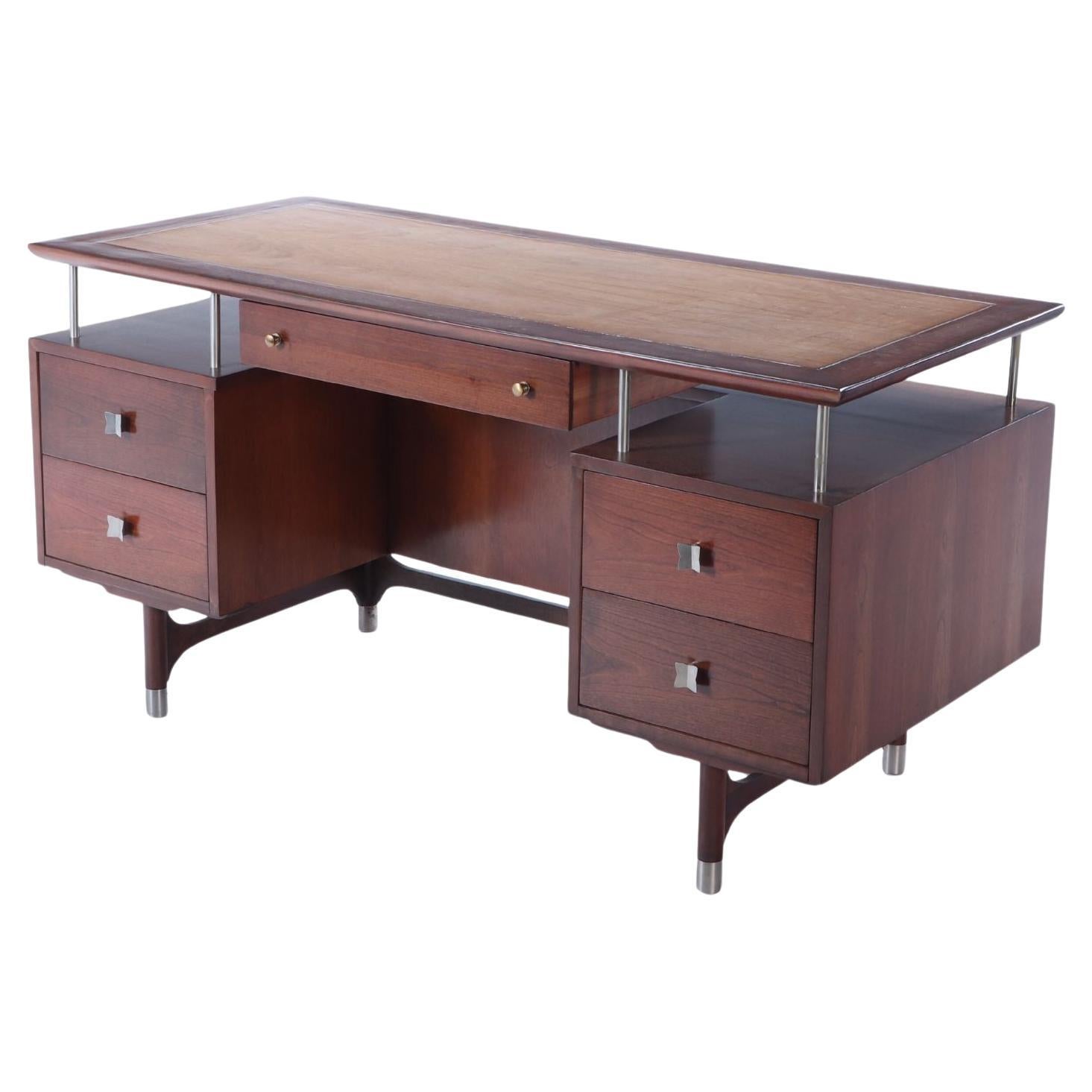 A Jens Risom mid century modern, double pedestal executive desk in cherry wood