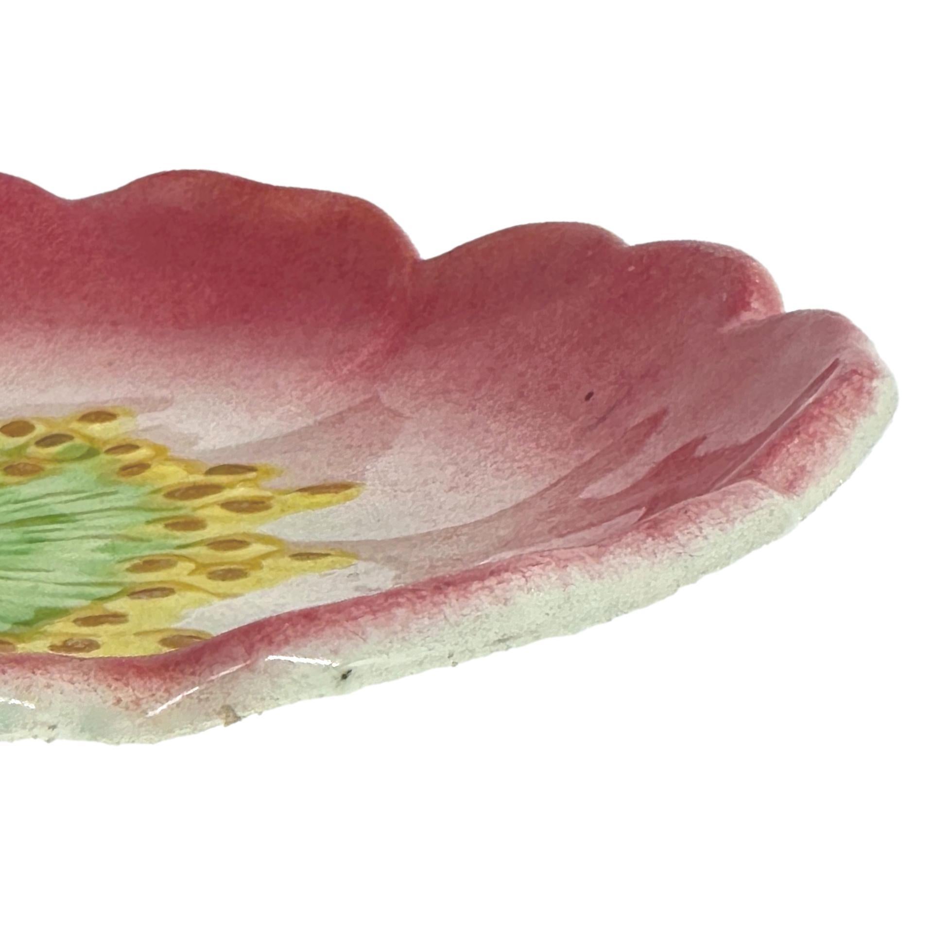 A Jerome Massier Majolica (Barbotine) Trompe l'oeil Dish, naturalistically molded as a rosehip flower glazed in pink, green, yellow, and ochre, the reverse with impressed oval mark 'J. MASSIER VALLAURIS, PIERRE PERRET SUCr.', French, ca. 1880.