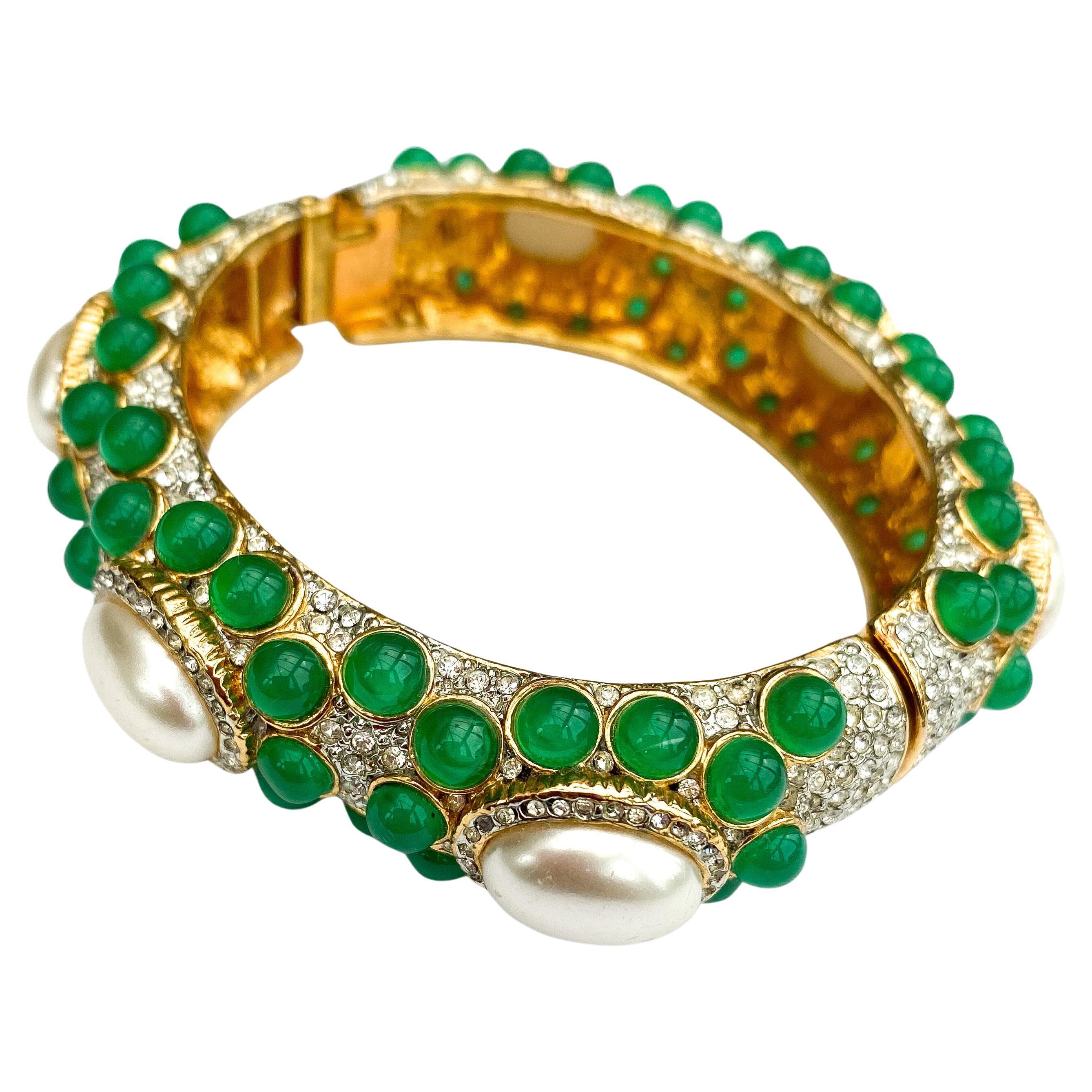 A jewelled and gilt bangle in the Moghul style, Kenneth Jay Lane, USA, 1970s For Sale