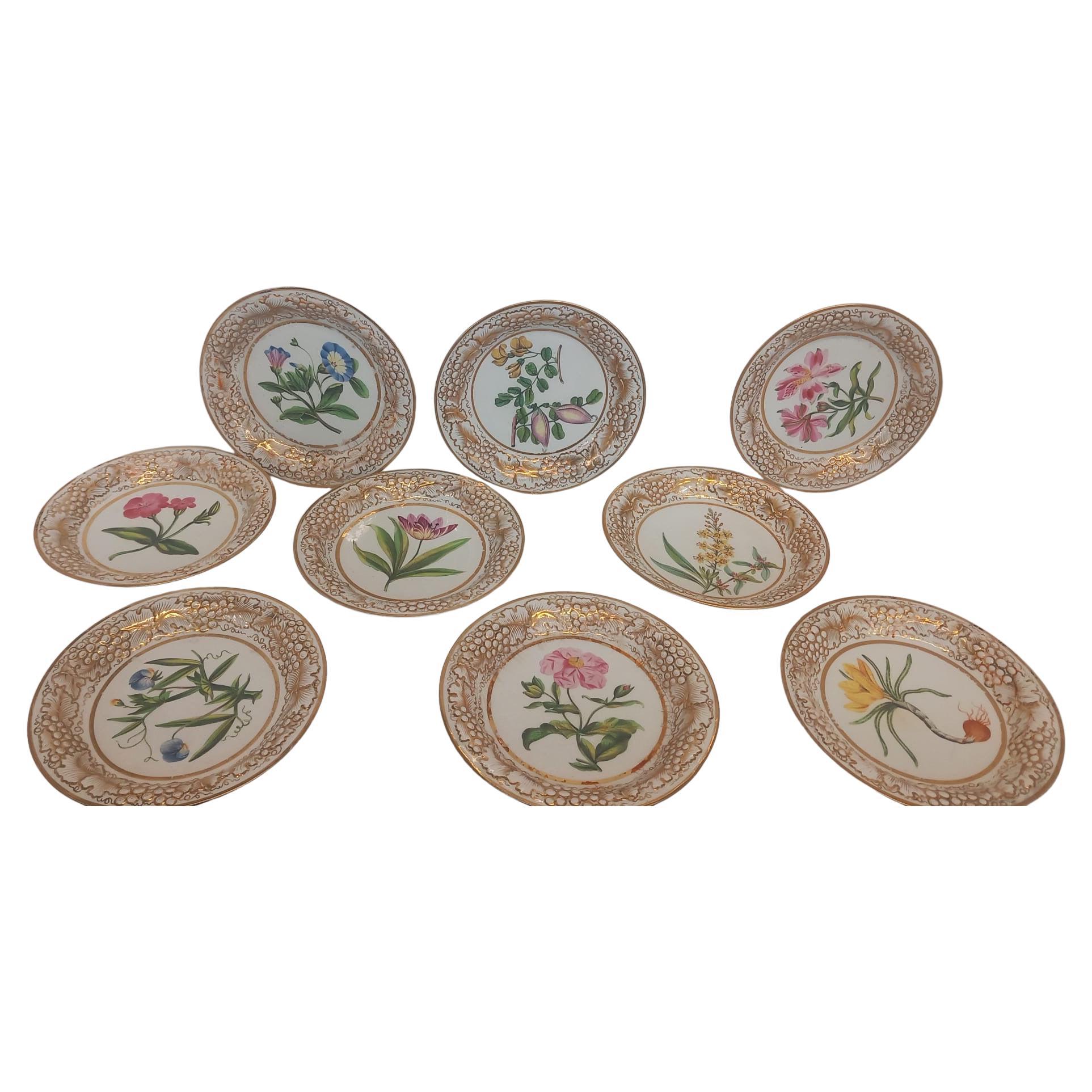 A John and William Ridgway antique part dessert service dating from the first quarter of the nineteenth century, circa 1815. 
Each plate, dish and tazza has an individual painted floral hand painted design, true to life, with its Latin name written