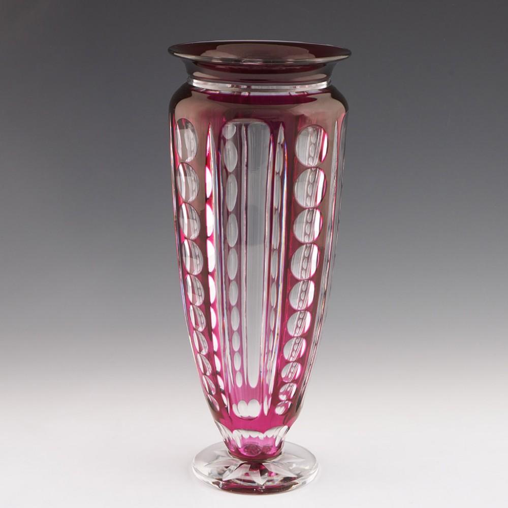 A Joseph Simon Design Vase Val Saint Lambert, c1930

Additional information: 
Date : c1930 , appears in the 1926 catalogue
Origin : Seraing, Belgium
Bowl Features : Magenta, cut to clear
Marks : None, this has lost its paper label
Type : Lead