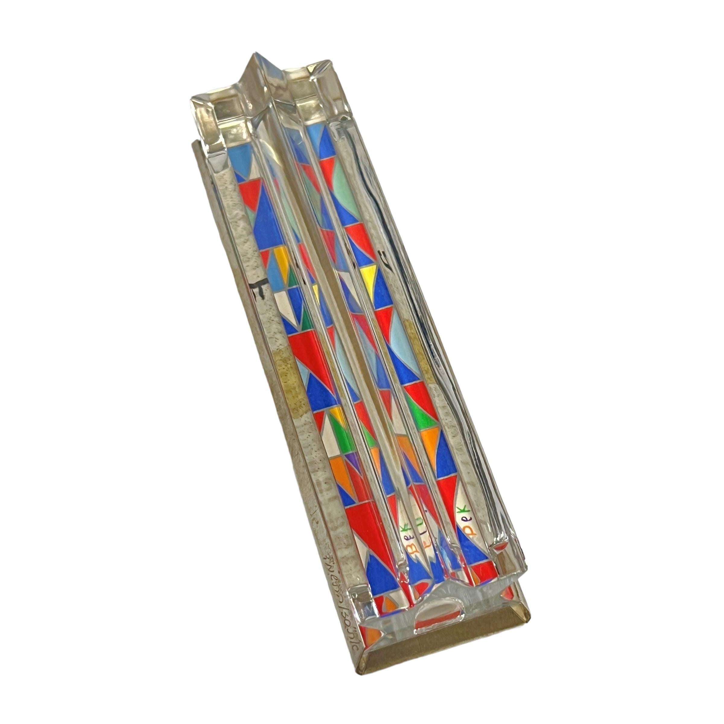 This exquisite Late 20th Century Art Glass, Sterling Silver Limited Edition Mezuzah by, Yaacov Agam and Daum and retailed by  Arta Gallery in Israel. The Agam Mezuzah features a beautiful crystal glass star of david shaped case, with Sterling Silver