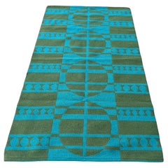 A Jutland Flat Weave Mills Rug after Verner Panton