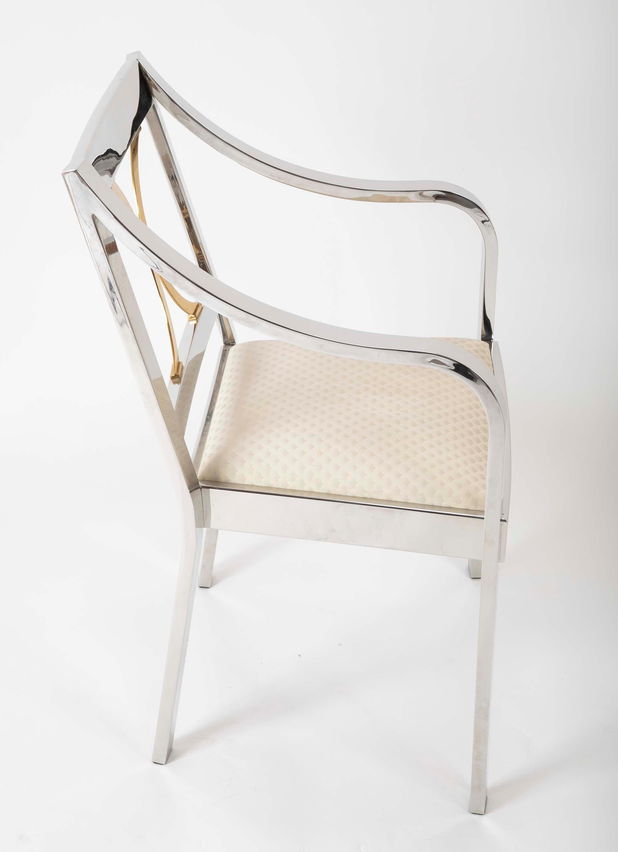 This elegant polished steel and brass Regency inspired armchair is of superb quality, made of highly polished steel and bass with an upholstered cushion by Karl Springer Ltd.