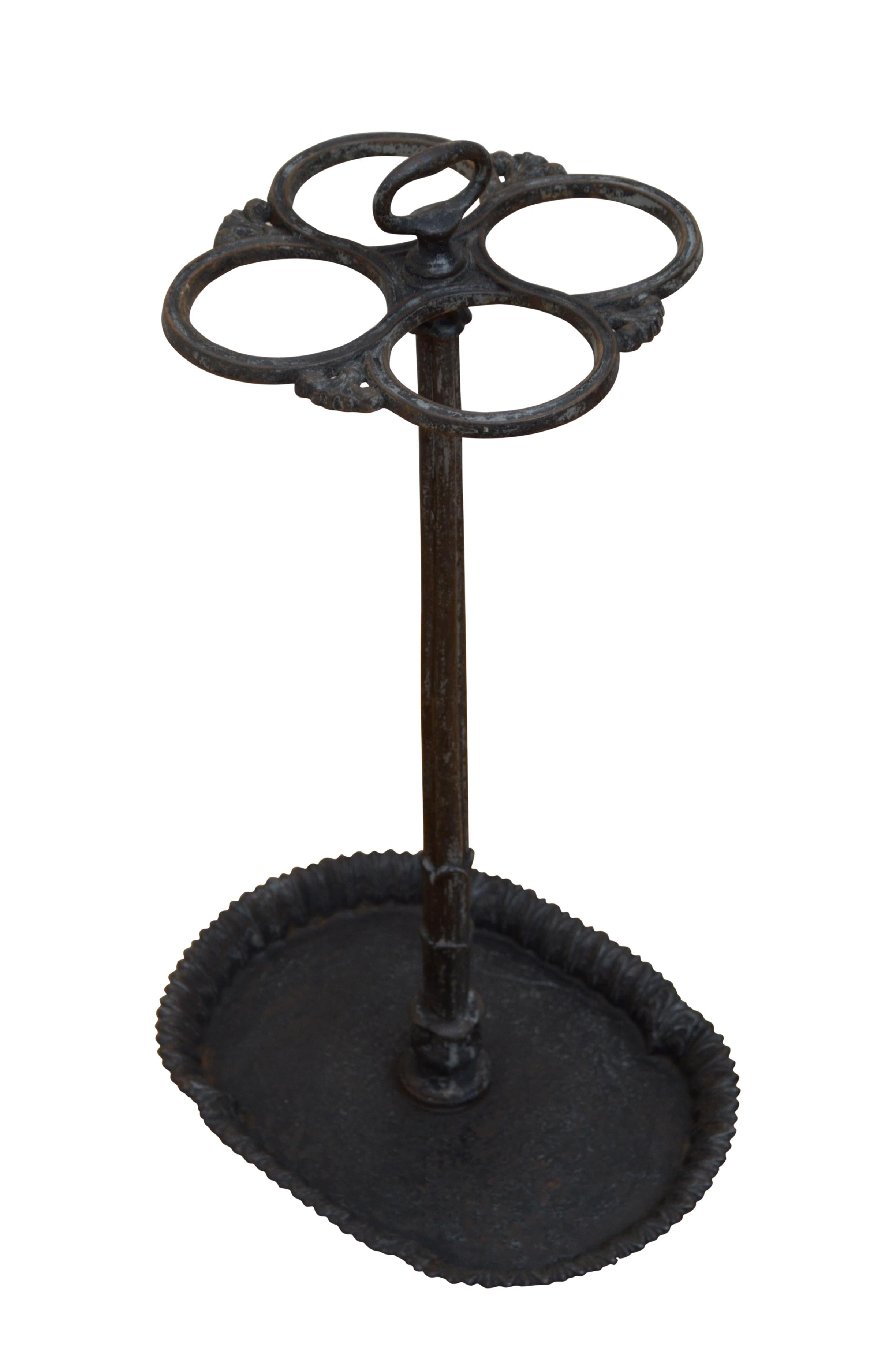 Excellent Victorian cast iron umbrella stand with four divisions, cluster column and dripping tray in Regency taste, all in home ready condition. c1880
Measures: H27