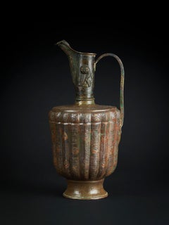 A Khorasan Silver And Copper Inlaid Bronze Ewer, 12TH Century